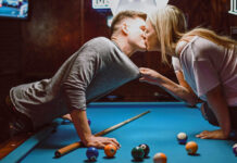 couple kissing on pool table following hookup rules